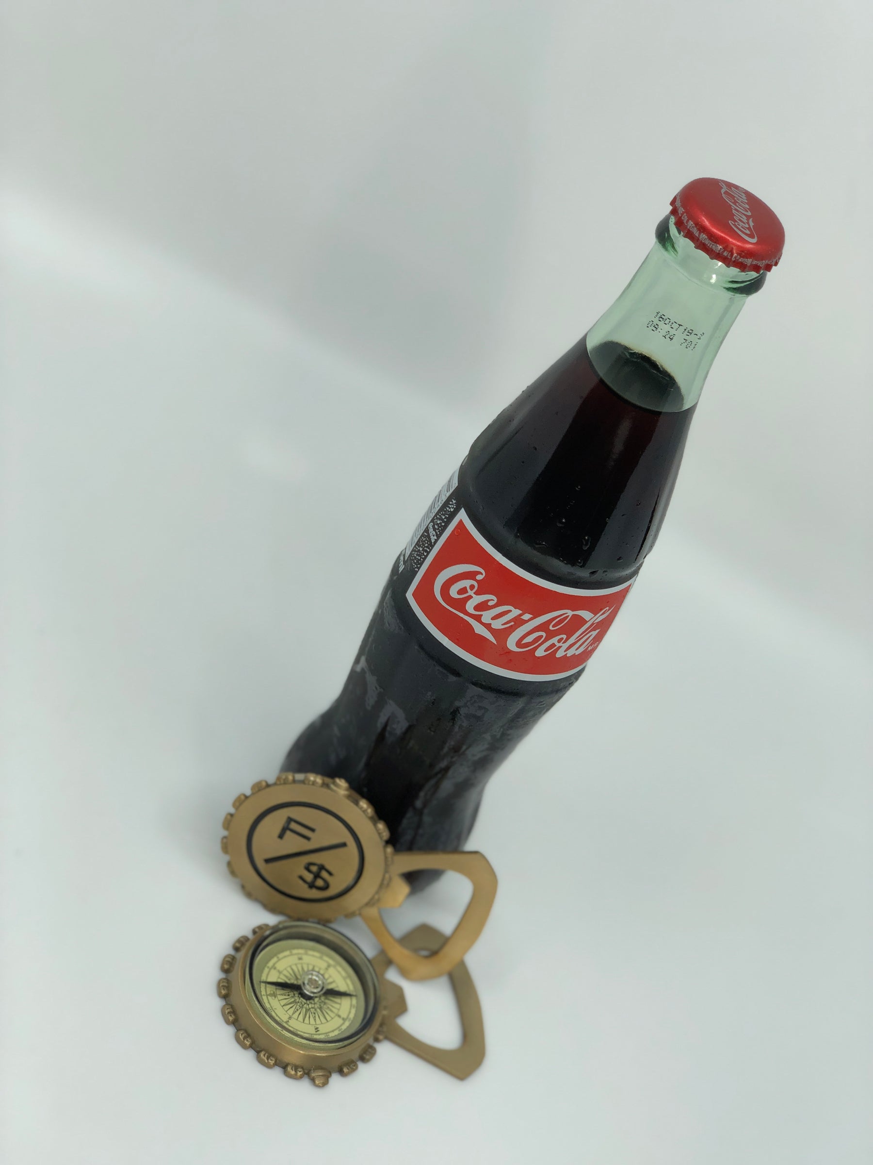 F/$ Bottle Opener (w/ Compass)